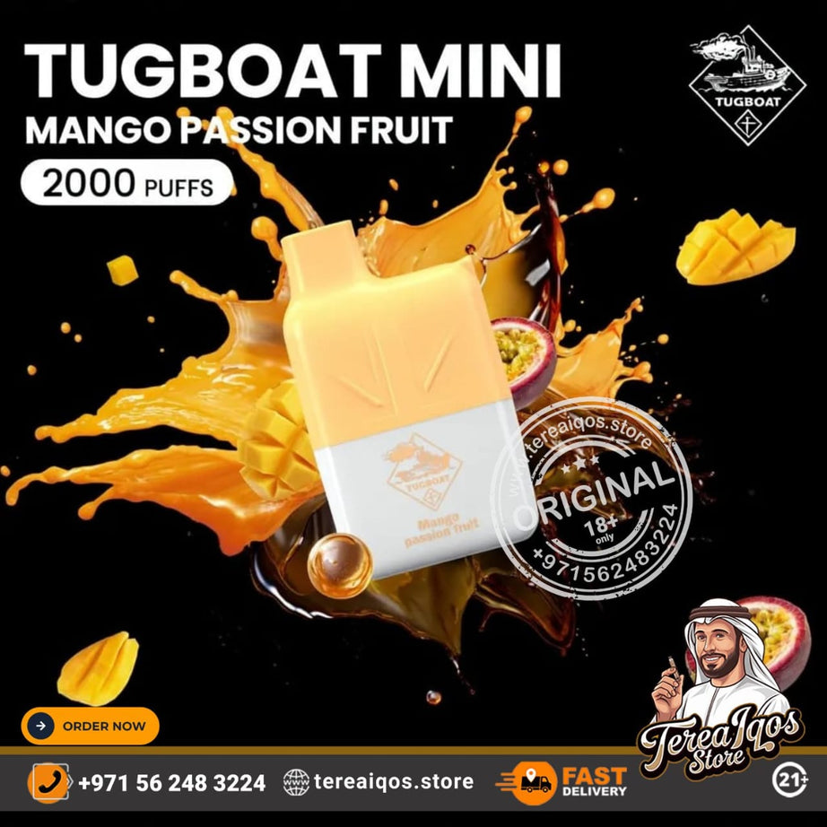 Tugboat Mini Mango Passion Fruit vape device with splashes of mango and passion fruit on a black background.